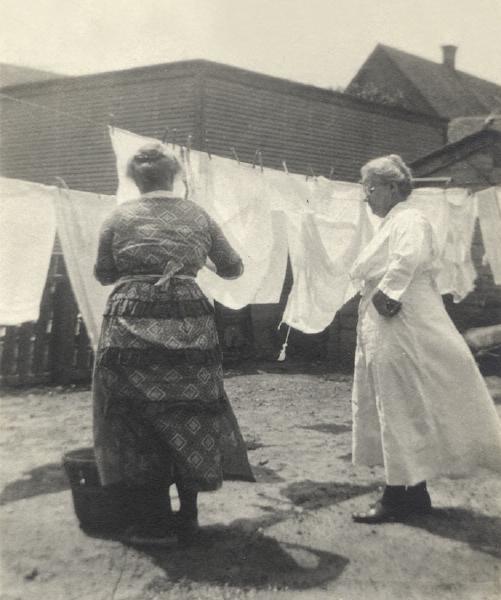Louise Hayes Wilson and sister Jenny Rushton Gorman on laundry day.