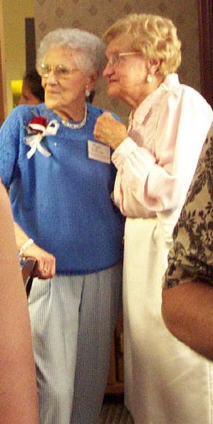 Ruth and her cousin Carmen Borth Keene share a moment at the 2002 family gathering